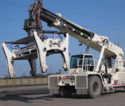 White truck and white crane attachment slab handler..jpg