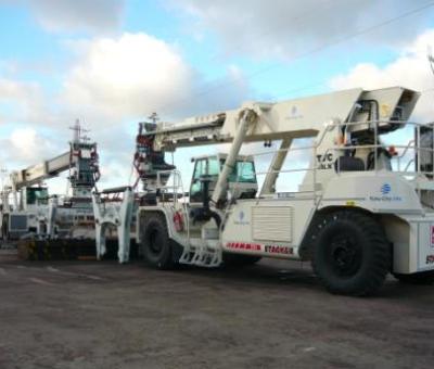 Three large white truck canes.